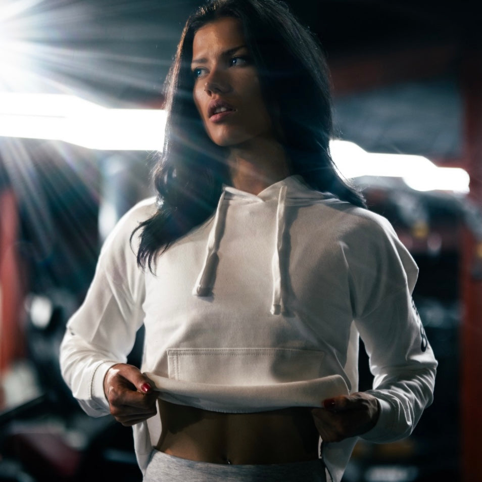 ”League Of Our Own” Ladies Hooded Crop Sweat - White